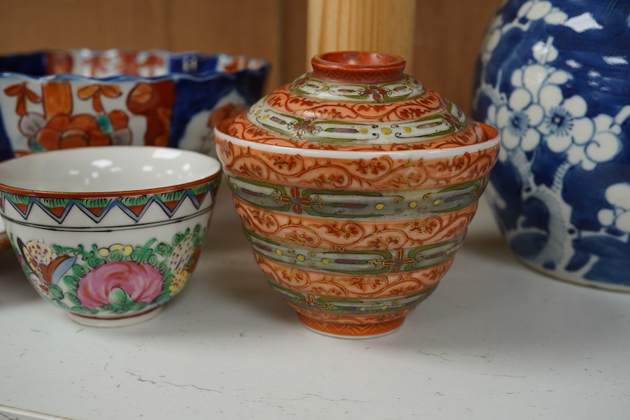 A Chinese Yixing teapot, a blue and white prunus jar, a Kutani tea bowl and two covers, other items, largest 15cm high